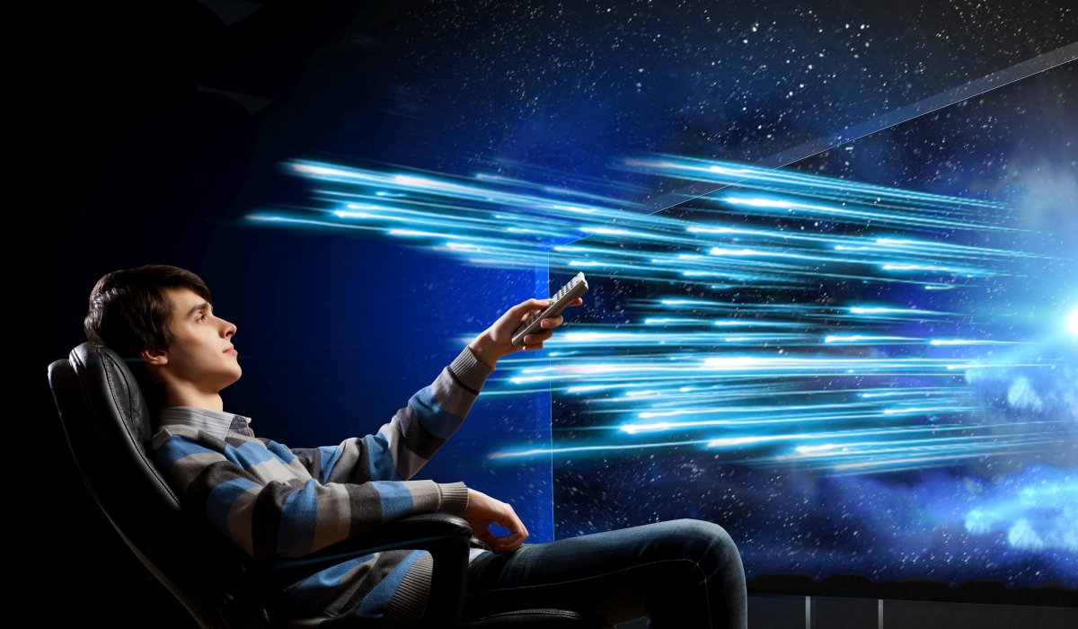 21929766 - young man watching football match on tv