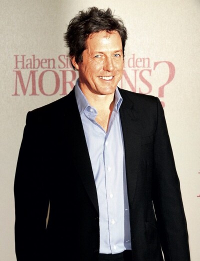 Hugh Grant se nechal nachytat s placenou společnicí!